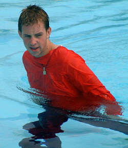 pool wading fully clothed pool sprint in anorak training suit