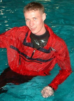 lifeguard with anorak in swimming pool