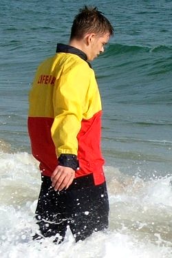 lifeguard in anorak and jeans