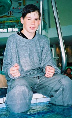Pool swim and jump in hoodie