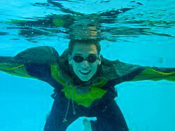 underwater swimming in rain suit