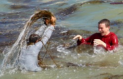 sea swimming in clothes
